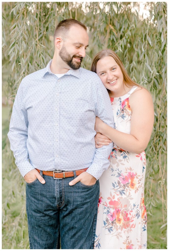 "couple in weeping willows at engagement session
