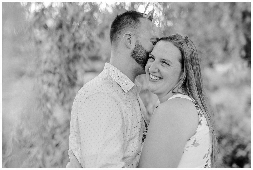 "couple laughing at engagement session