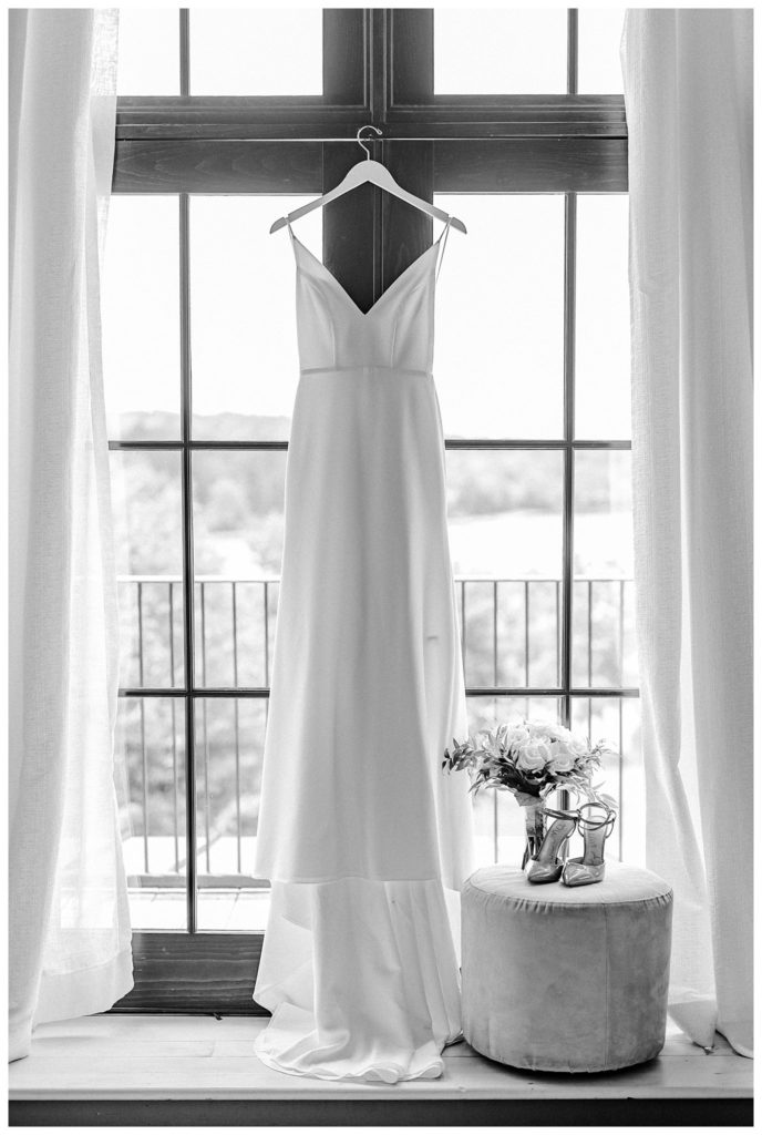 "black and white wedding dress shot at the lake house inn"