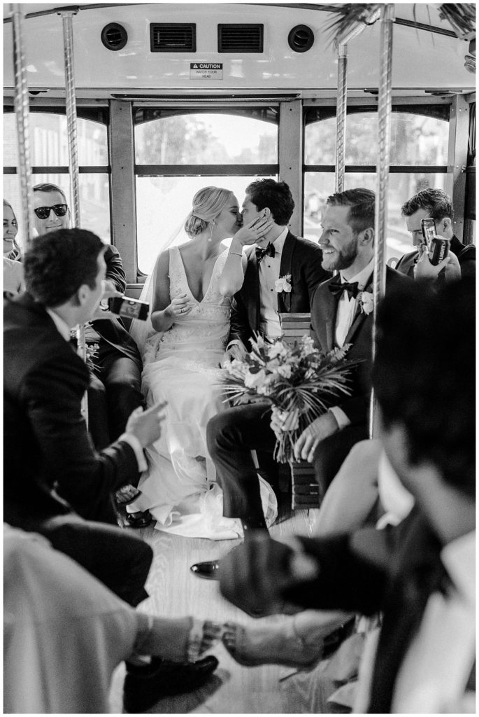 couple in wedding trolley